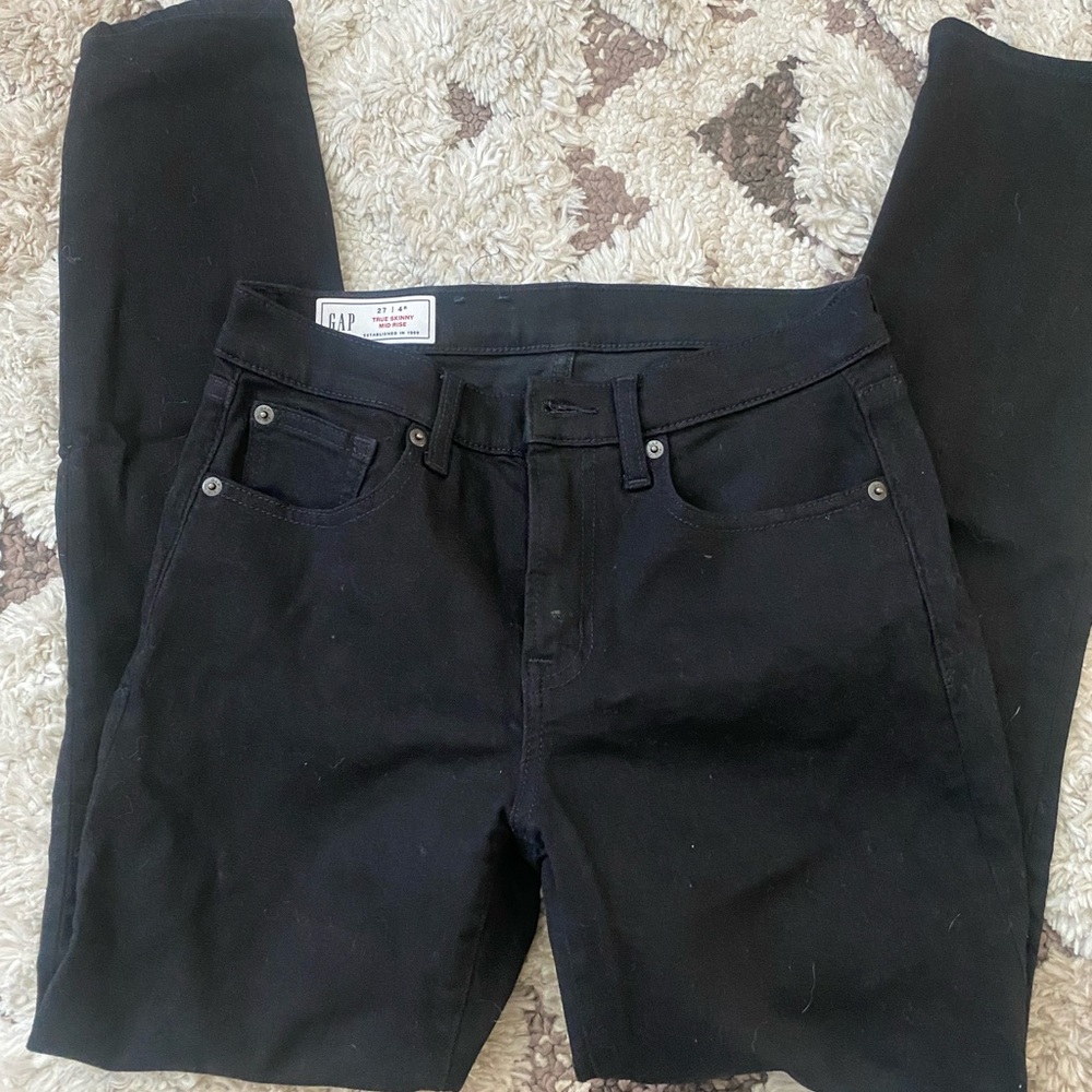 Black mid rise skinny jeans